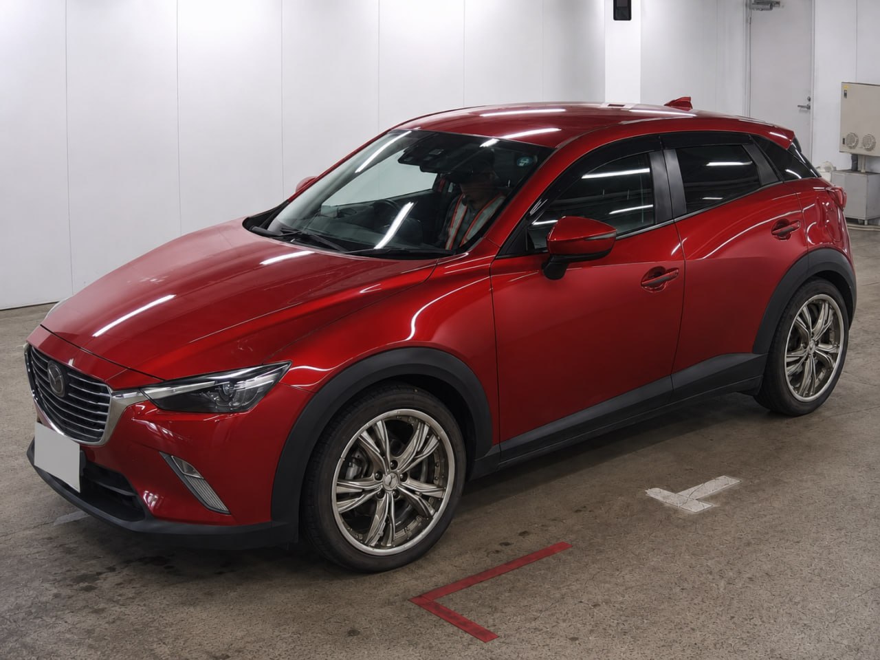 Красная Mazda CX-3: миллион, дизель и аукционная четвёрка